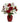 Red roses, white lilies, and daisies in a red vase.